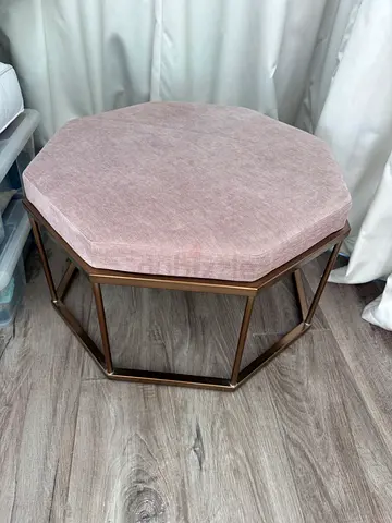 Hexagonal velvet upholstered ottoman with bronze metal frame
