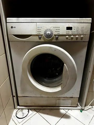 Used front-load washing machine - LG, needs cleaning/repair