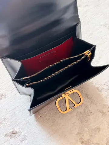 Black leather Valentino VLogo Crossbody Bag with gold hardware - good condition