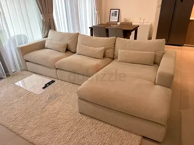 Beige L-shaped 3-seater Sofa with Cushions - Good Condition