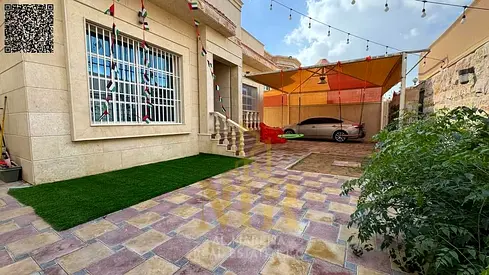 بالمويهات 1_ عجمان | فيلا علي مساحه ارض 5000 قدم ~ 4 غرف ماستر + تشطيب راقي | بسعر يشمل رسوم الكهرباء والمياه والمكيفات