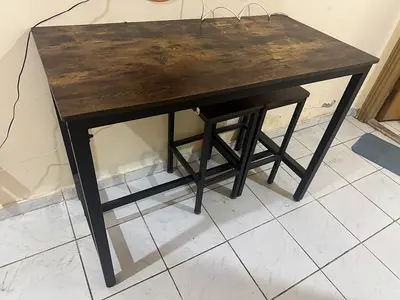 Big table with 2 sitting chairs