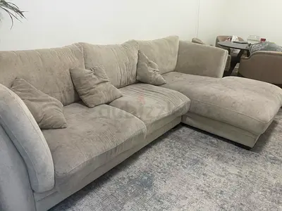 Light grey L-shaped fabric sofa with chaise - good condition