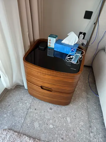 Title: 2 × Home Centre Somerton walnut bedside tables with glass top (matching pair) – AED 1,000