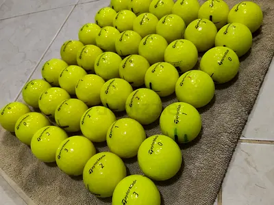 Taylor made distance plus golf balls yellow color available..grade A condition ..