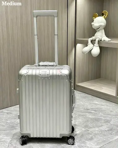 RIMOWA SILVER M SUITCASE