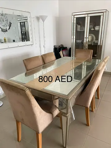 Dining table with 6 upholstered chairs - mirrored finish