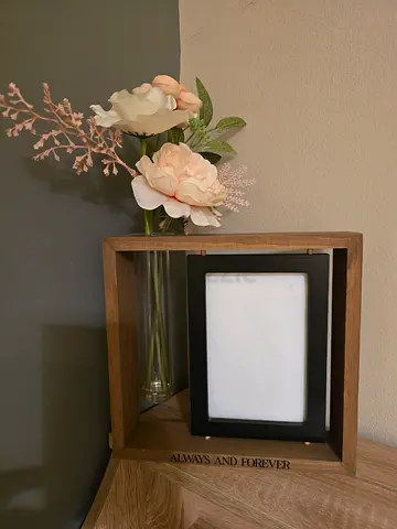 wooden photo frame built-in glass vase with flowers