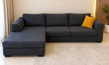 Dark grey L-shaped 3-seater sofa with chaise, good condition