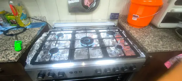 Used 5-Burner Stainless Steel Gas Cooker with Oven - Good Working Condition .. فرن بحالة ممتازة
