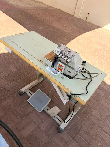 Industrial Overlock Sewing Machine with Table and Pedal - Good Working Condition
