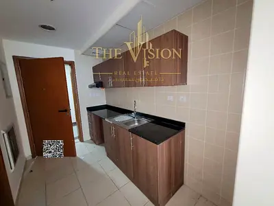 Studio for rent in Ajman Towers partial city view