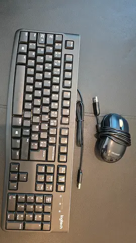 Logitech wired USB keyboard and Microsoft wired USB mouse - good condition