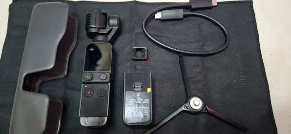 DJI Osmo Pocket 2 with case, tripod and accessories - good condition