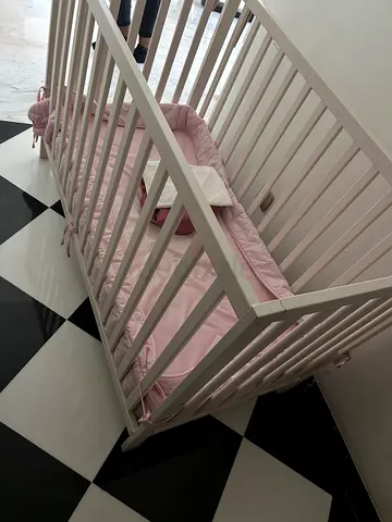 White Wooden Baby Cot/Crib with Pink Bumper - Good Condition