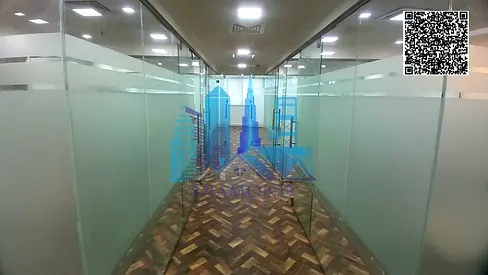 An investment opportunity office for sale in Falcon Towers, Ajman, currently leased with an 11% annual return.