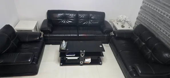 Black leather 3-piece sofa set with coffee table - good condition
