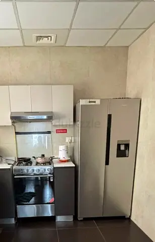 Side-by-side Stainless Steel Fridge with Water Dispenser - Good Condition