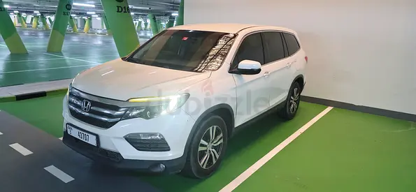 Lowest price for URGENT SALE! Honda Pilot GCC. Ex. Excellent condition. Pure white