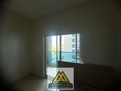2BR in City Tower, Nuaimiya 3, master bedroom, 2 balconies, free parking. AED 40,005, 4 payments.