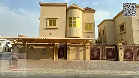 Villa for rent in Al Rawda, Ajman, featuring 5 master bedrooms, a majlis, a living area, and a maid