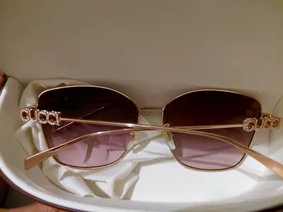 Gucci women's sunglasses with crystal logo - light gold frame