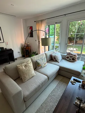 Light beige L-shaped sectional sofa - good condition
