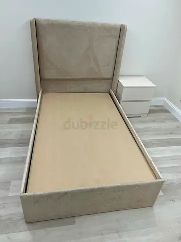 Single beige upholstered bed frame with headboard  --- Only Bed