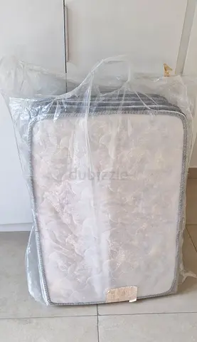 Used Baby Cot Mattress - Firm, Clean, White (in protective wrap)