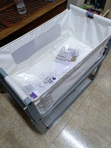 White bedside bassinet / cradle in good condition