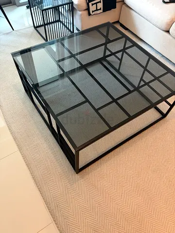 Black metal frame glass coffee table - modern geometric design