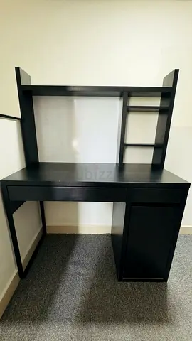 Compact black study desk with shelves and cabinet - good condition