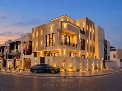 A corner villa featuring a luxurious Saudi-style design, spanning two floors plus a roof terrace. It boasts a prime location directly opposite a mosqu