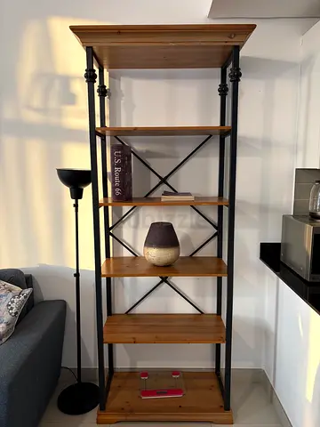 Industrial-style wooden shelving unit with metal frame