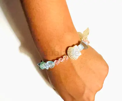 Handmade beach-themed charm beaded bracelet with shell and heart charms