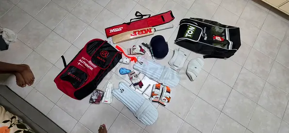 Cricket kit - pads, gloves, helmet and bags (unused)