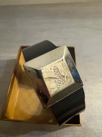 Gucci black leather belt with large silver buckle
