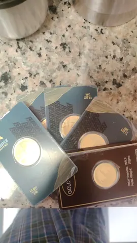 24 carrot gold coins with bill
