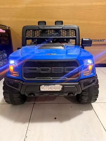 Battery-Powered Blue Kids Ride-On Ford-Style Truck with Lights