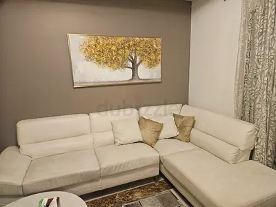 Cream L-shaped Leather Sofa - Good Condition, Comfortable Corner Sofa
