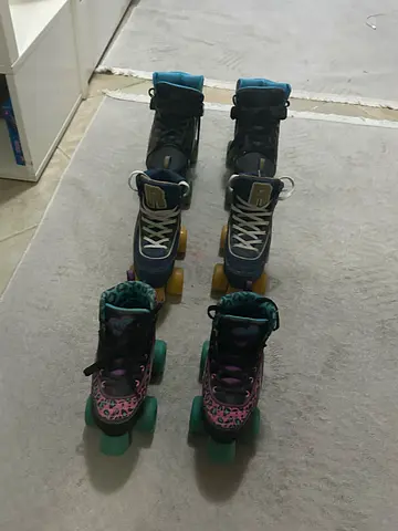 3 Pairs of quad roller skates - good condition