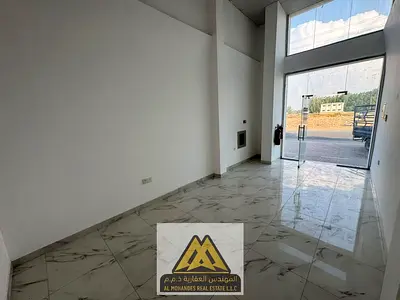 Al Yasmeen, Ajman: Spacious shop for annual rent. AED 30,000/year, 4 payments, cheque deposit.