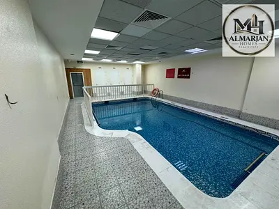غرفتين و صالة في وسط عجمان بمساحة ممتازة و خزائن حائط و تكييف مركزي مع جيم و مسبح و غرفة بخار داخل التاور بجوار مدرسة الحكمة