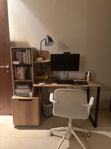 Compact wooden study desk with shelving - good condition