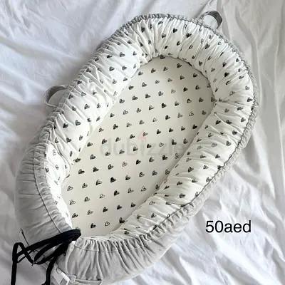 Baby lounger / nest with heart print - gently used