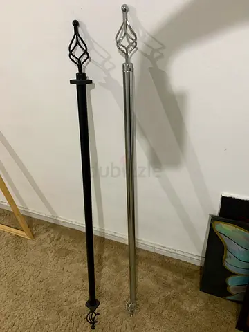 Pair of decorative curtain rods (black and silver) - good condition