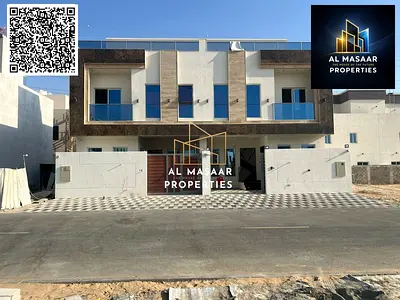 Townhouse in the heart of the Al-Yasmeen area, featuring two floors and a roof terrace; freehold ow