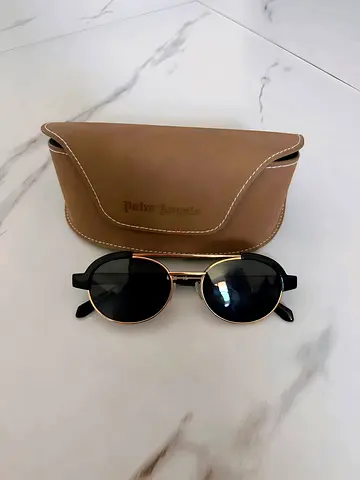 Round metal frame sunglasses with brown case (Palm Angles )