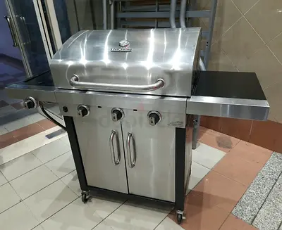 Char-Broil Performance TRU-Infrared 3-Burner Gas Grill with a side burner and lower storage cabinet,