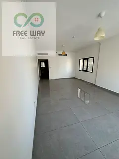 Two bedrooms and a living room, including access to a swimming pool, a gym, and parking; the kitchen